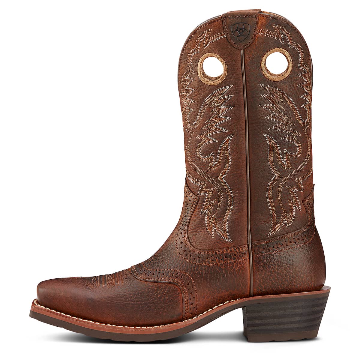 Brown Ariat cowboy boot with intricate leatherwork on a white background