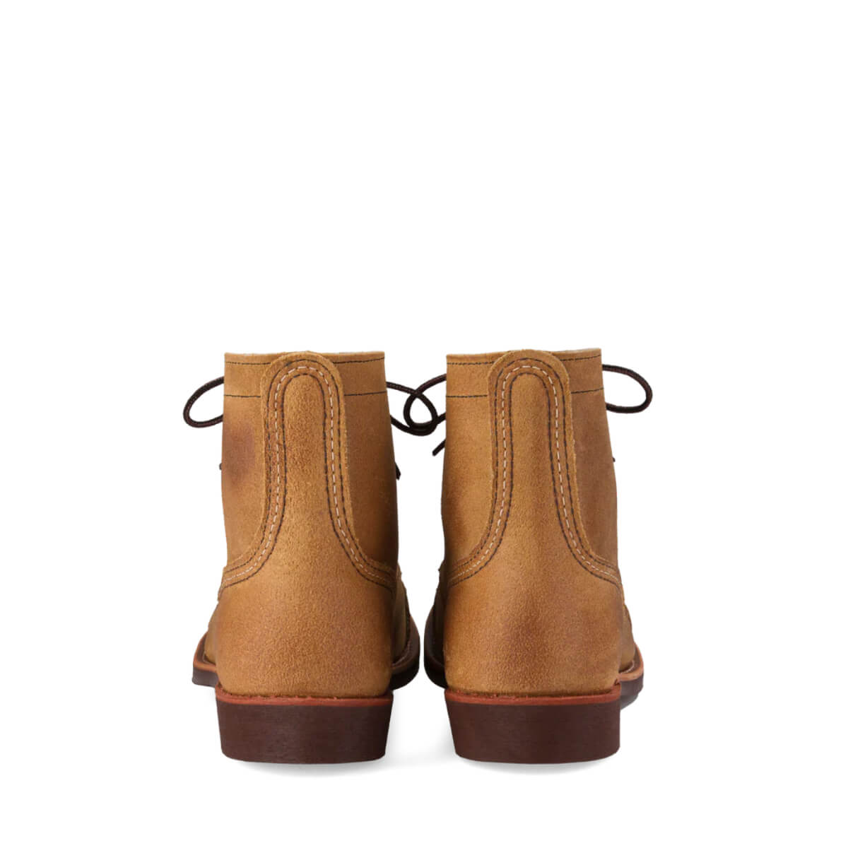 Pair of brown leather boots on a white background