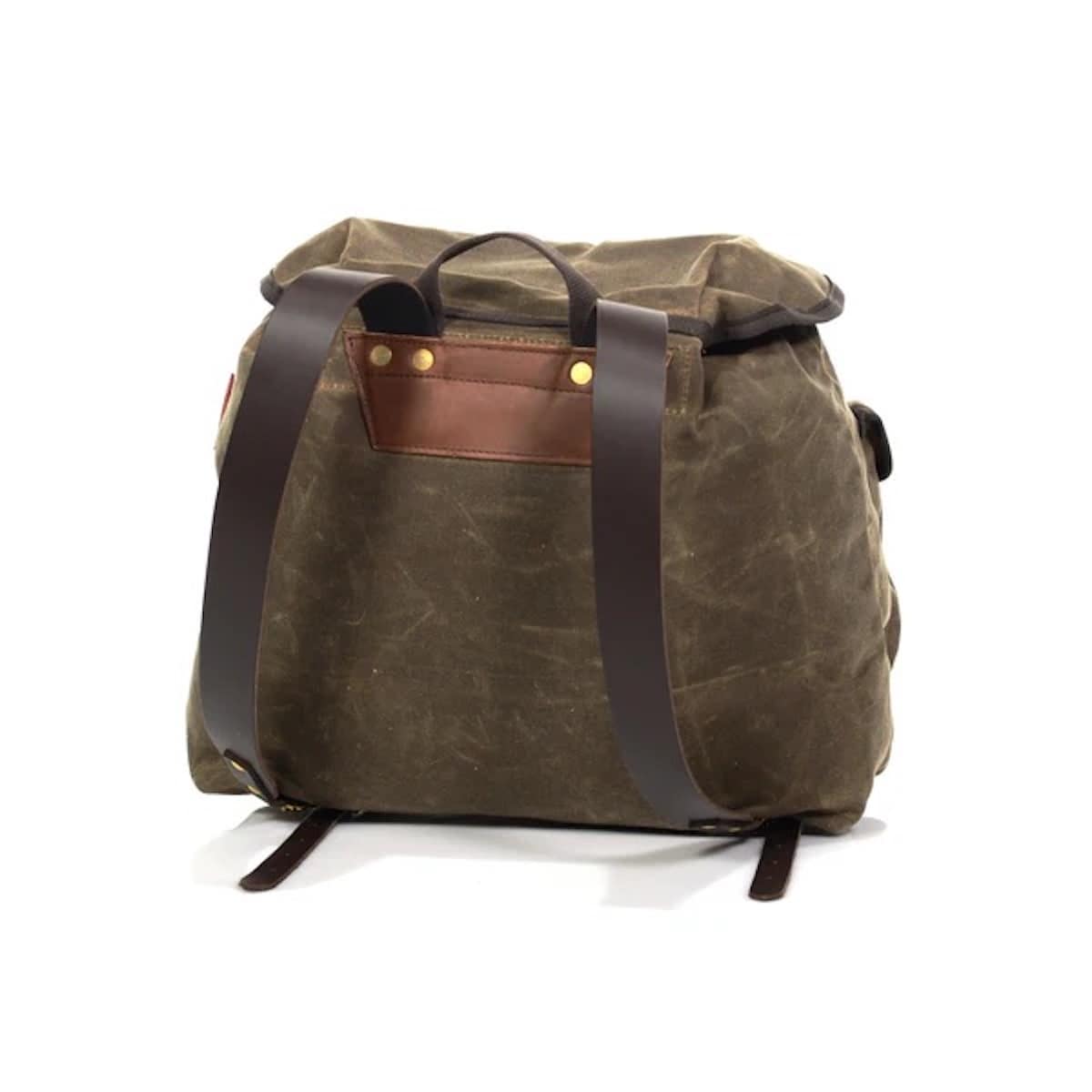 An olive green waxed canvas duffel bag with dark brown leather handles, a front pocket, and brass rivets, shown on a white background.
