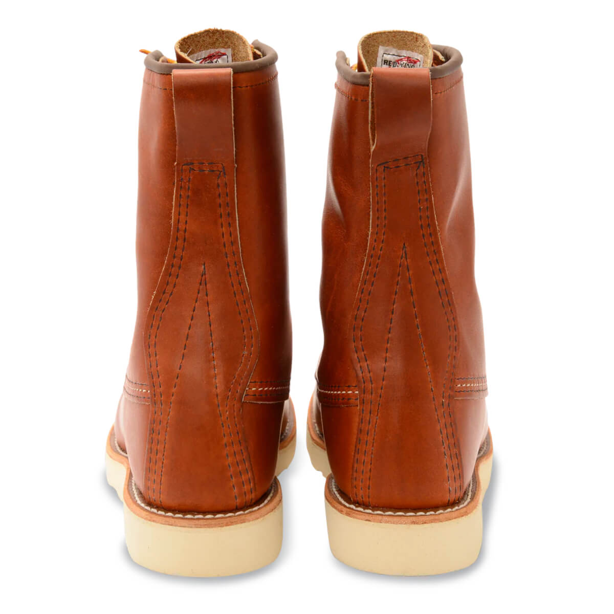 Pair of brown leather boots on a white background