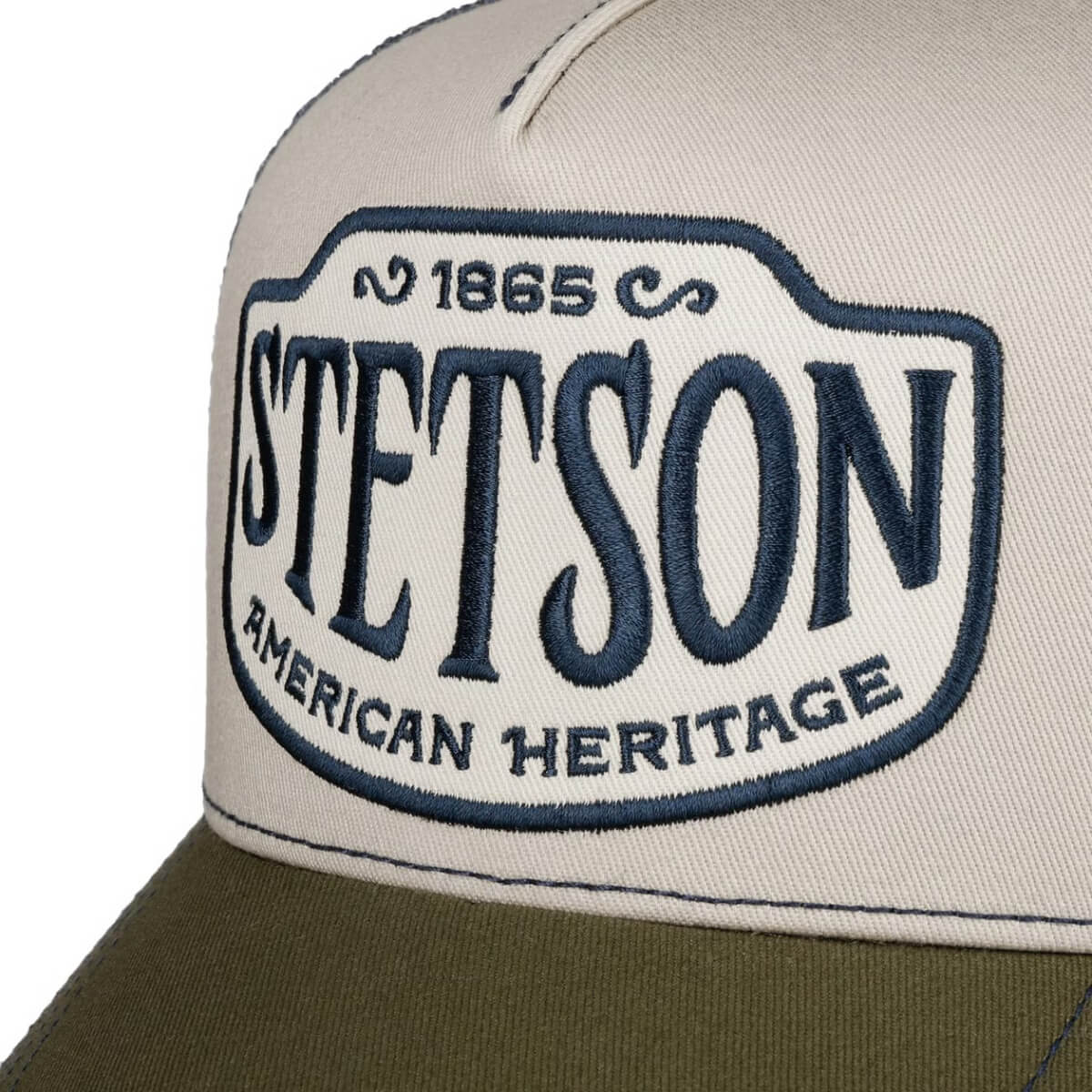Stetson cap with logo and text on a beige and green background