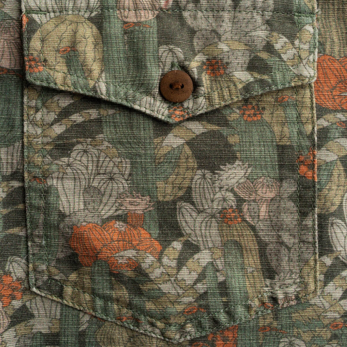 Floral patterned fabric with a button detail