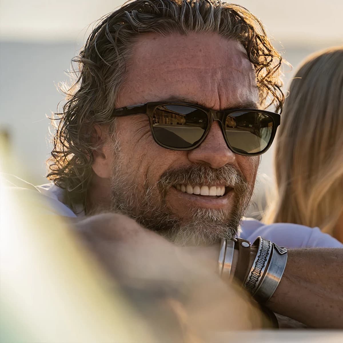 Man wearing Vallon sunglasses with a blurred background