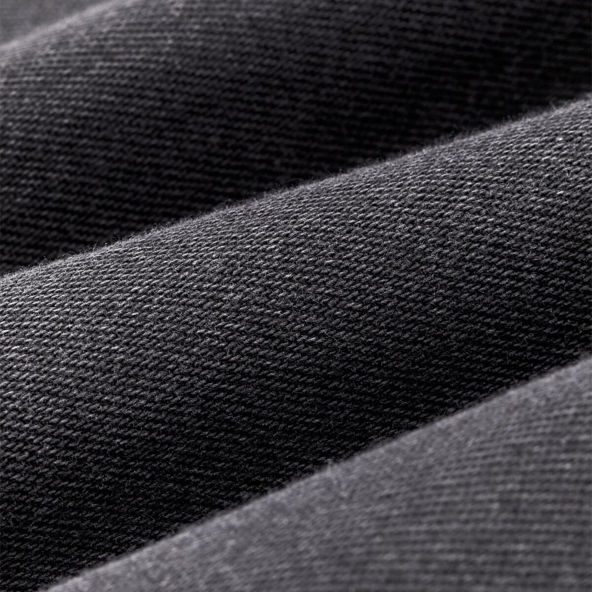 Close-up of black fabric with a textured pattern