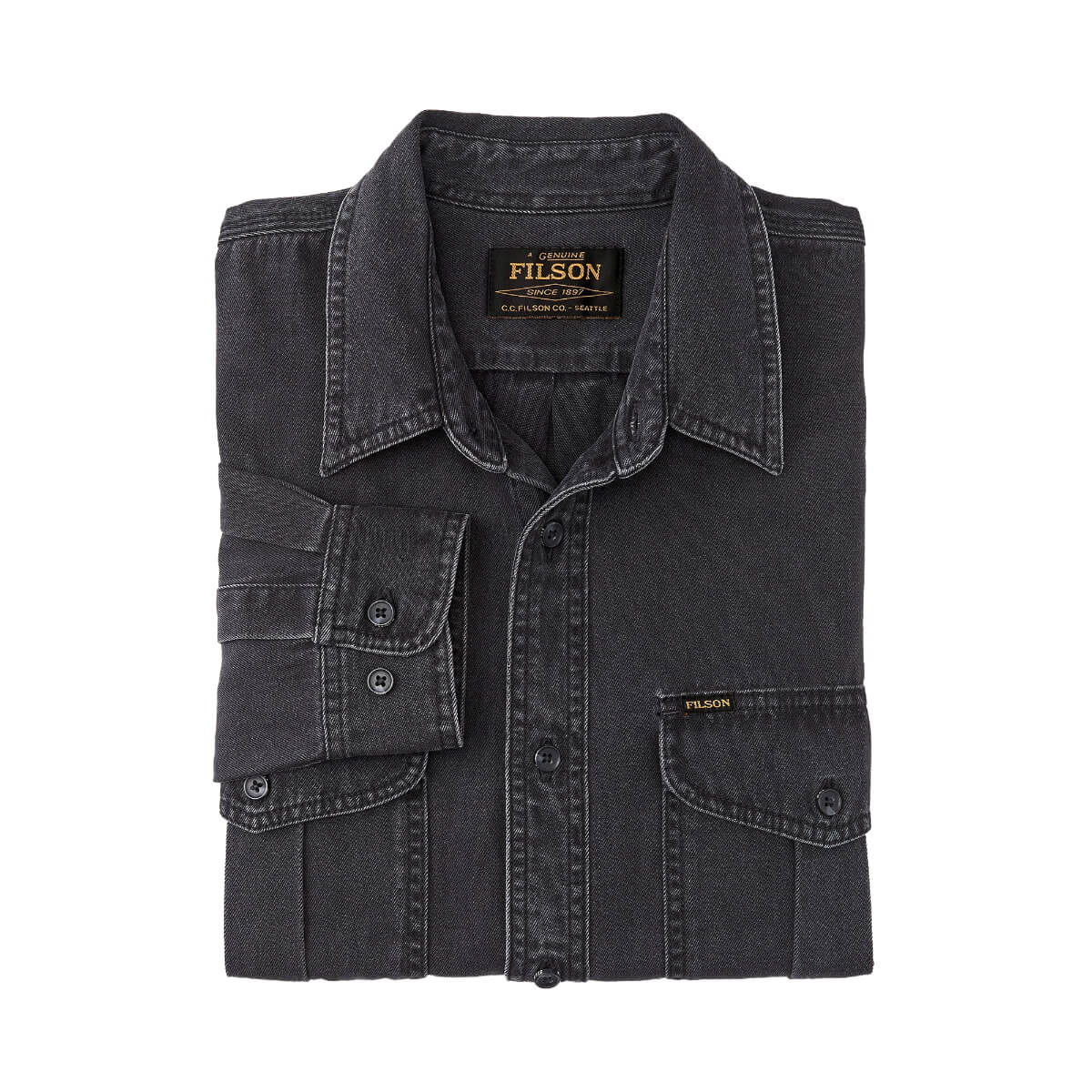 Folded black denim shirt with Filson logo on a white background