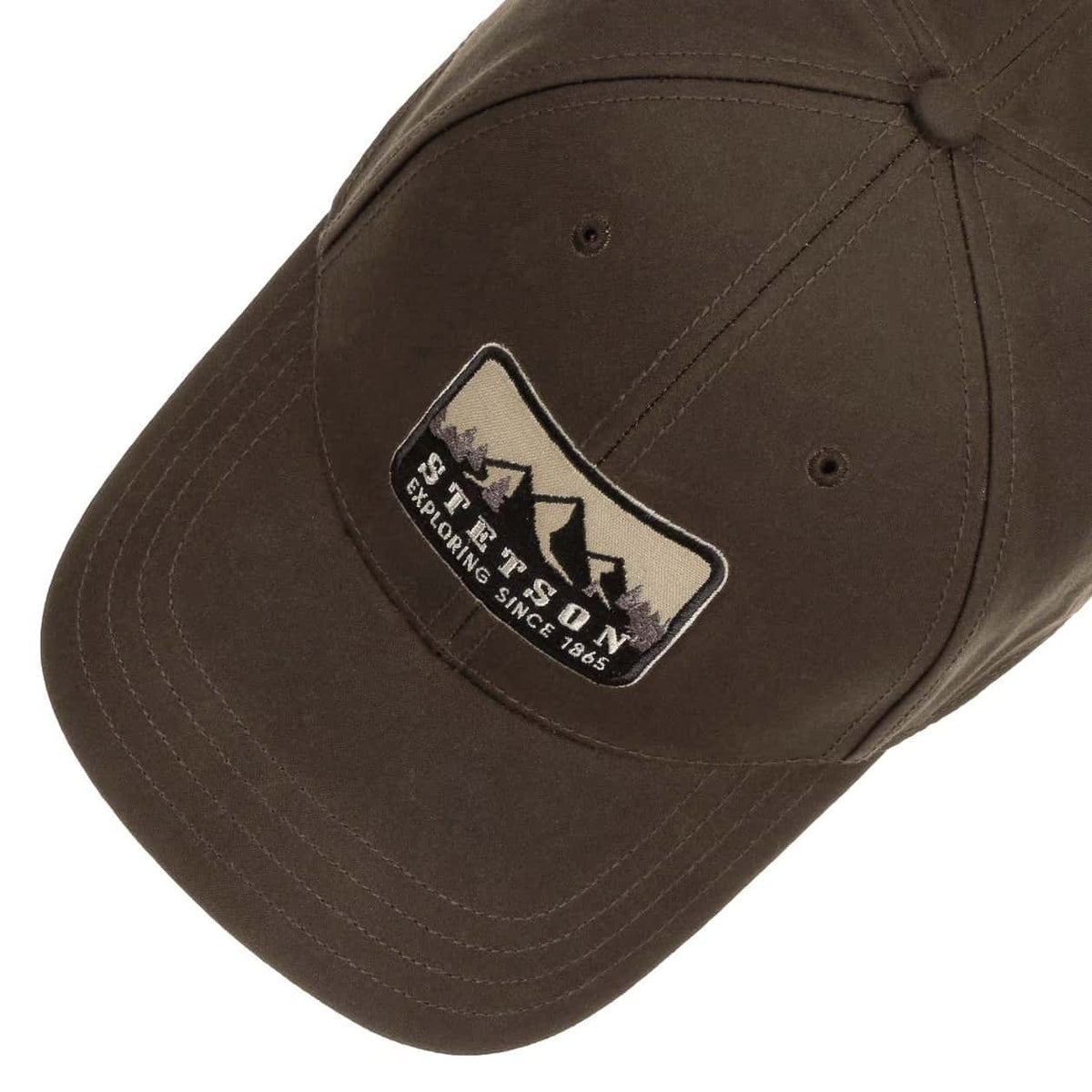 Green Stetson Waxed Cotton Explorer Cap with a white logo on a white background