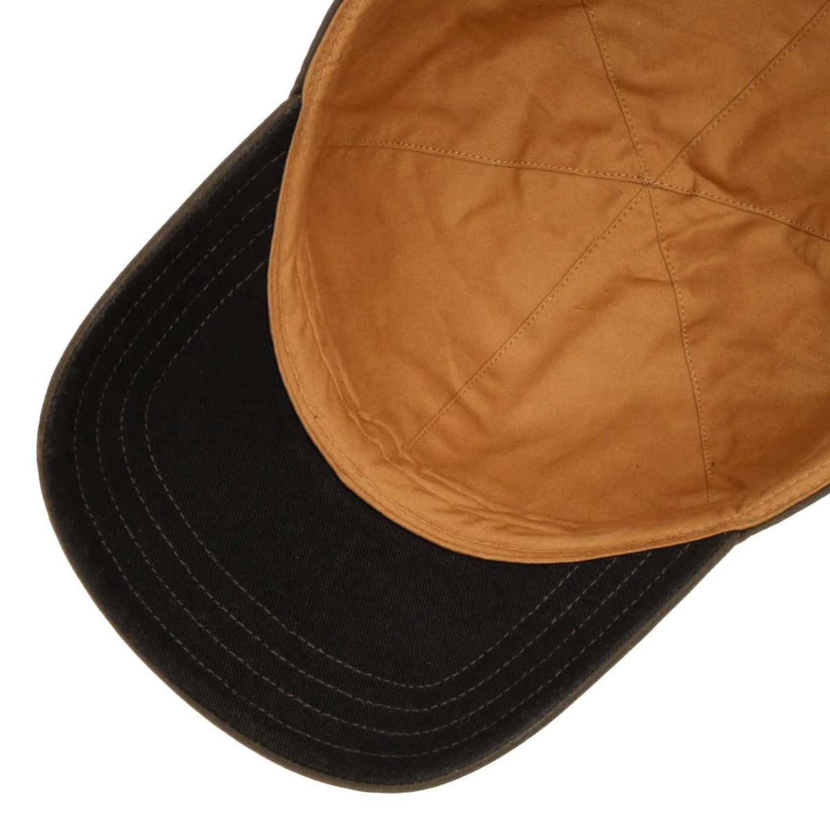 Close-up of a black and brown cap on a white background