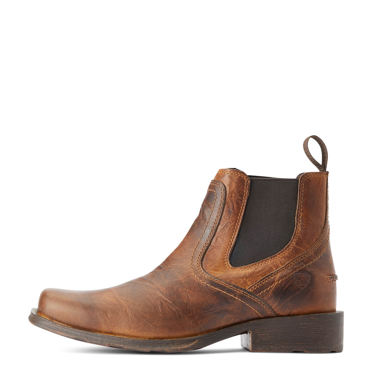 Brown leather Chelsea boot on a white background