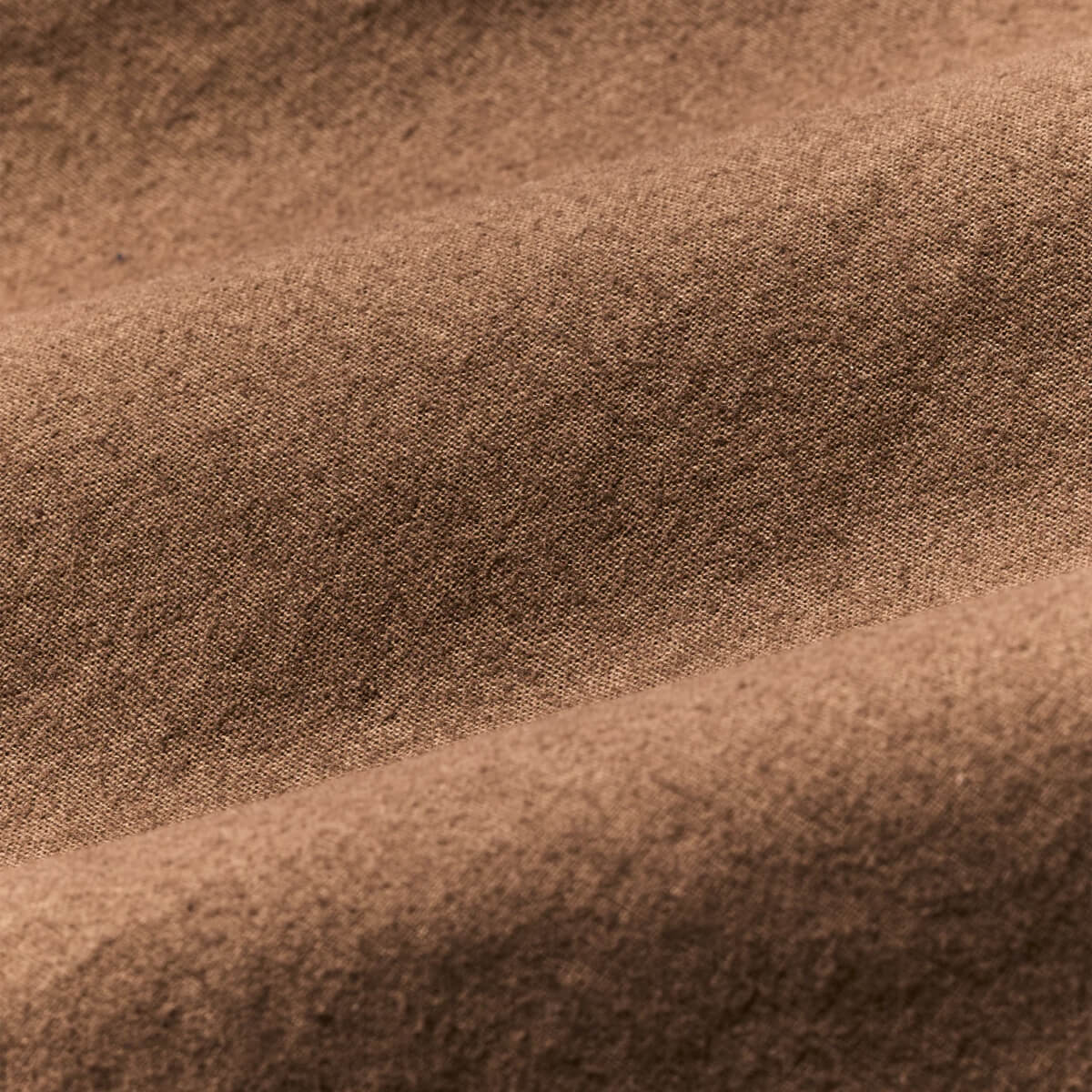 Close-up of brown fabric texture