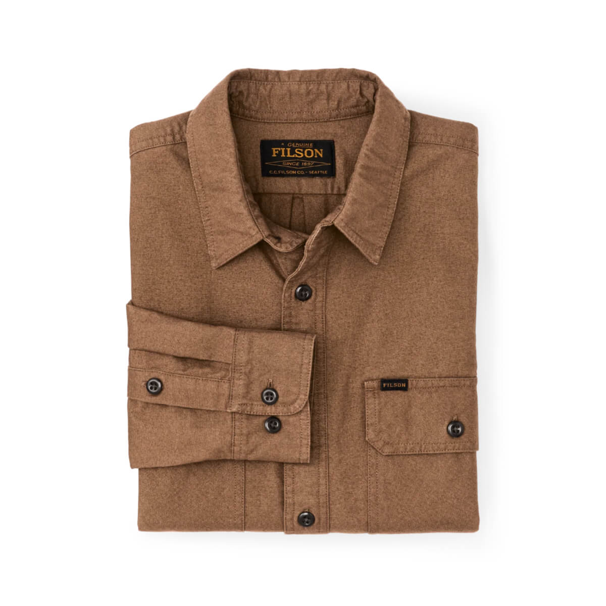 Folded brown shirt with Filson logo on a white background