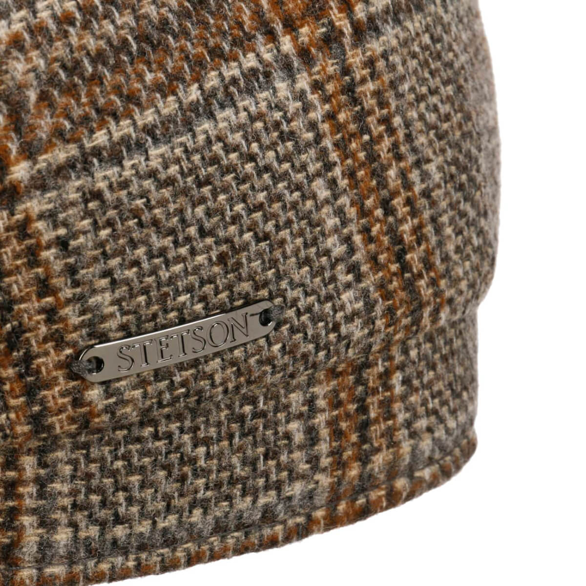 Close-up of a houndstooth patterned fabric with a Stetson label.