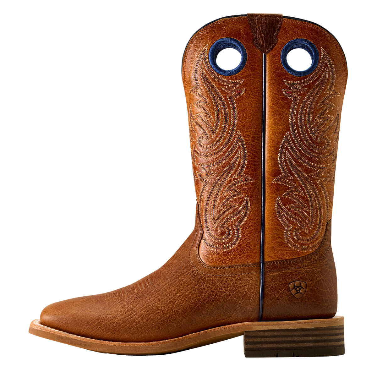 Brown cowboy boot with intricate leatherwork on a white background