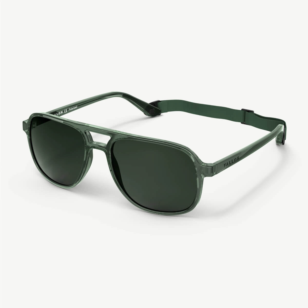 Green sunglasses with a thin frame on a white background