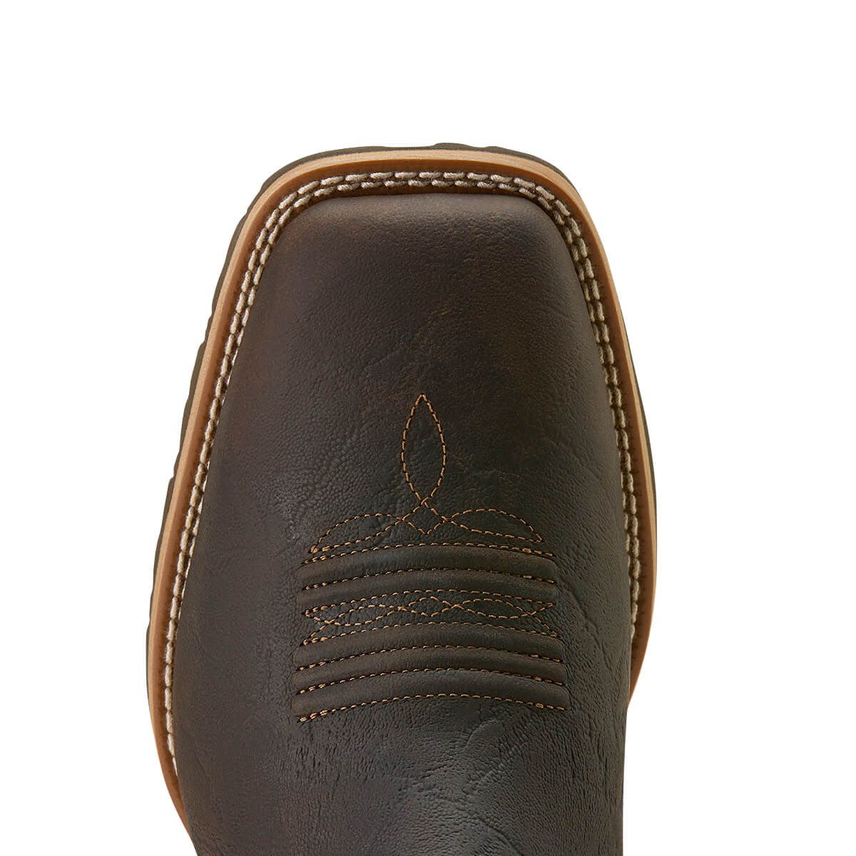 Close-up of a brown leather boot with stitching detail on a white background
