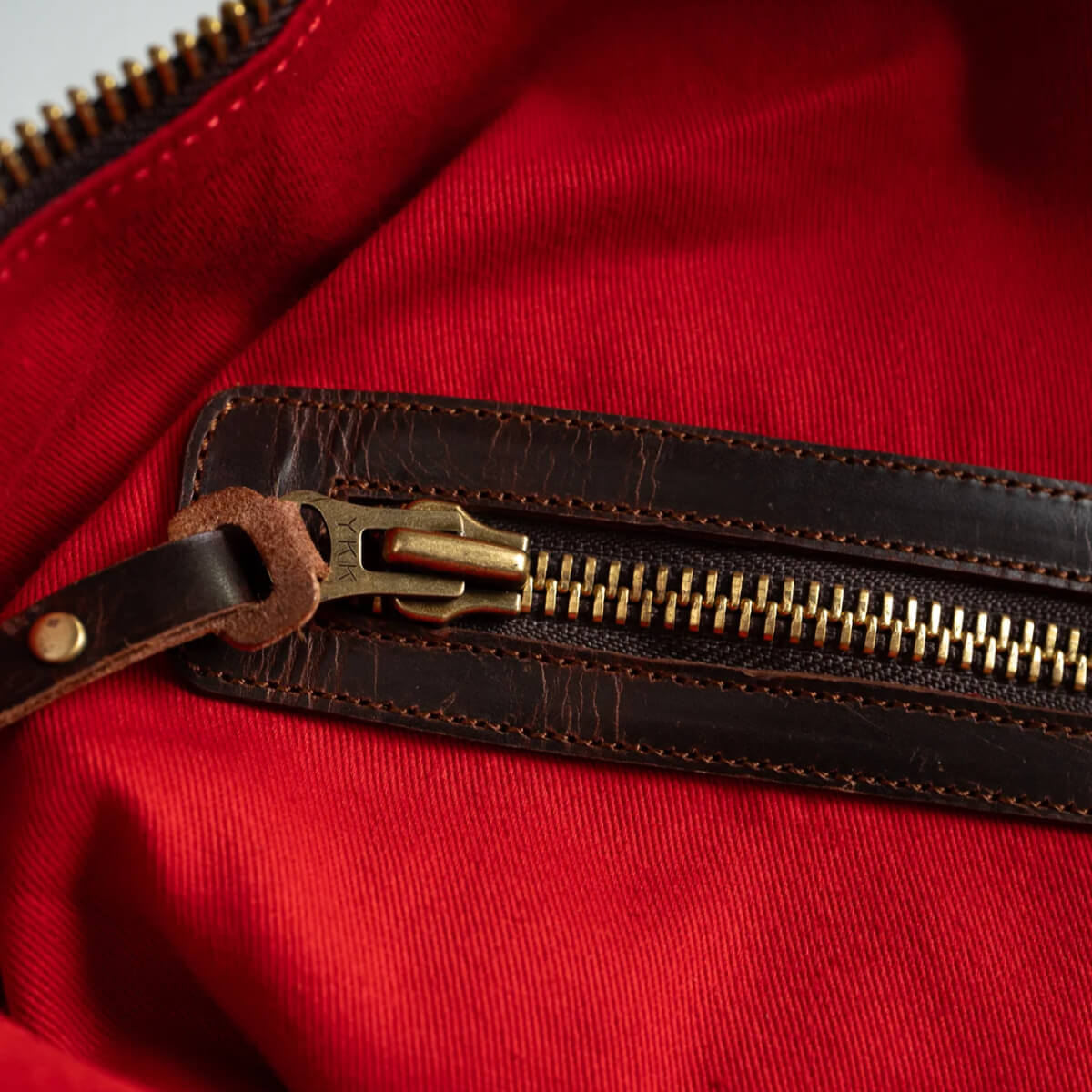 Iron and Resin Yampa Buffalo Suede Duffel Bag red lining