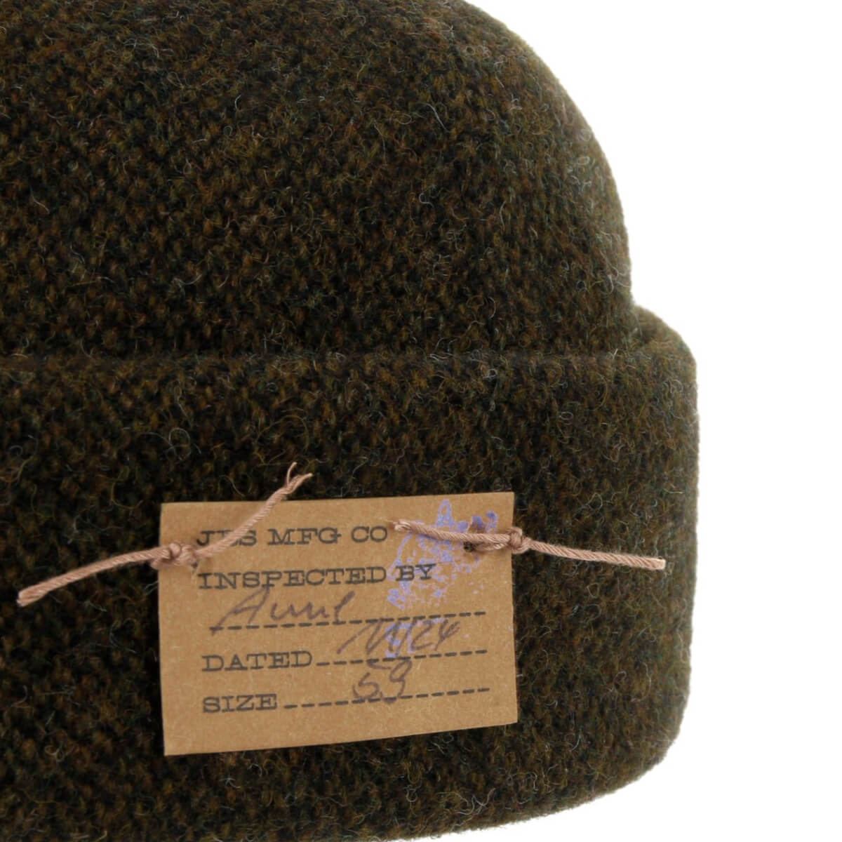 Brown textured beanie with a label on a white background