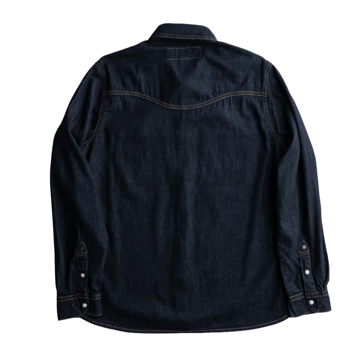 Indigo denim shirt on a white background