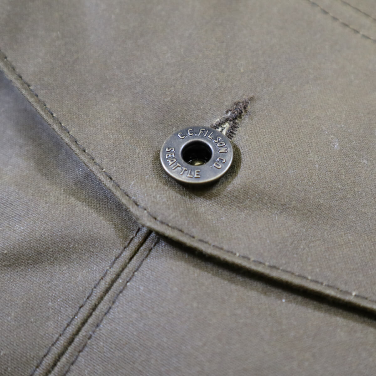 Close-up of a label on a piece of clothing with 'C.P. Company' branding.