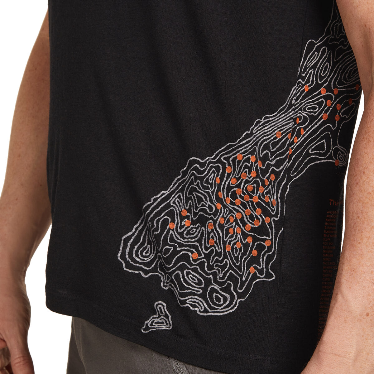 Black sleeveless shirt with a white and orange graphic design on a white background