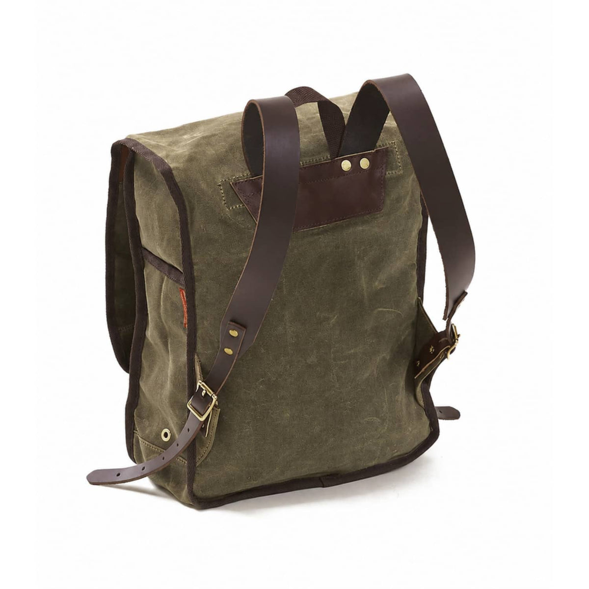 An olive green waxed canvas backpack with dark brown leather trim, shoulder straps, and a front pocket, shown on a plain white background.
