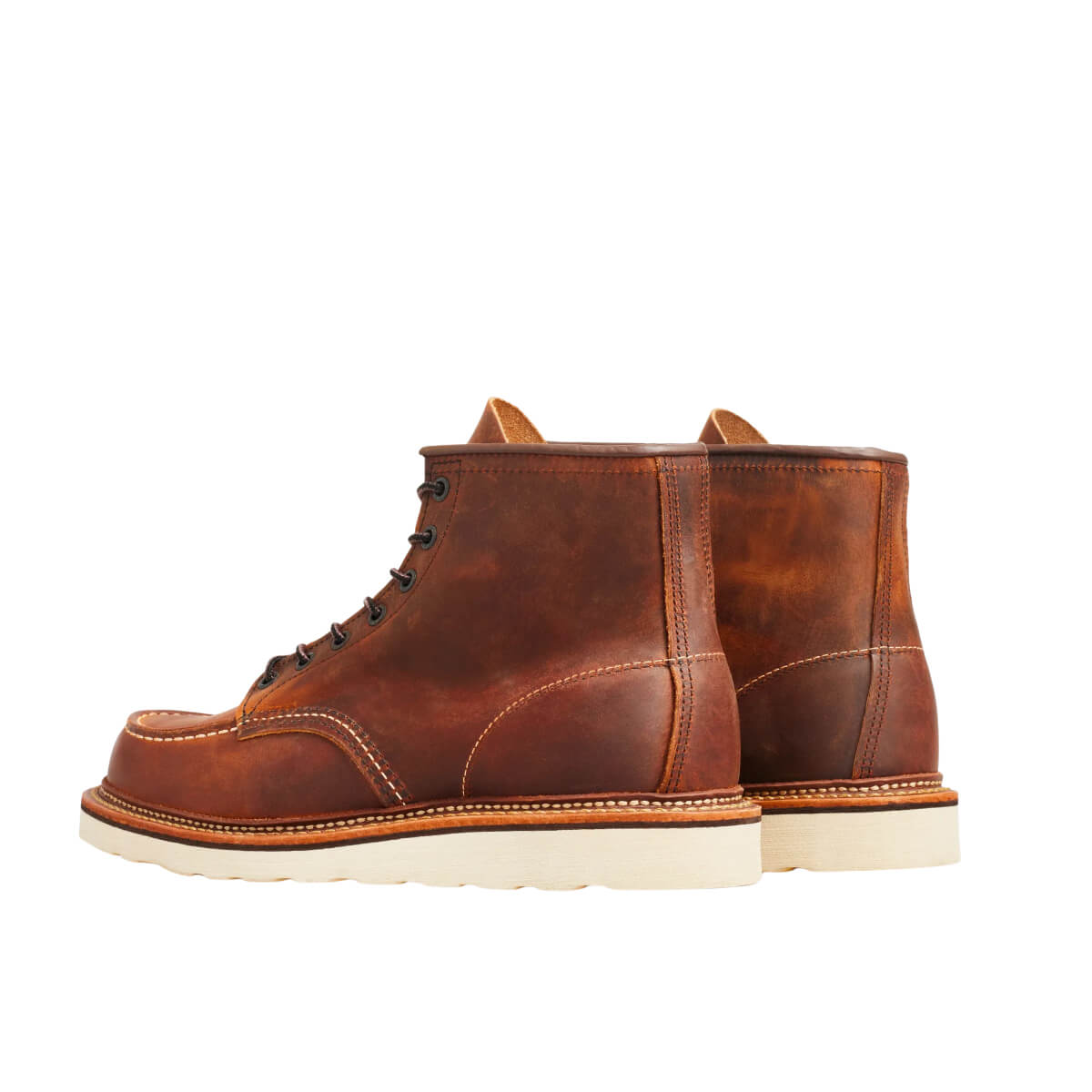 Brown leather boot on a white background
