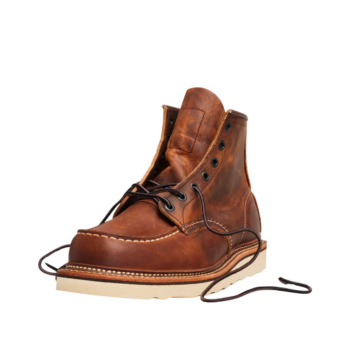 Brown leather boot with black laces on a white background