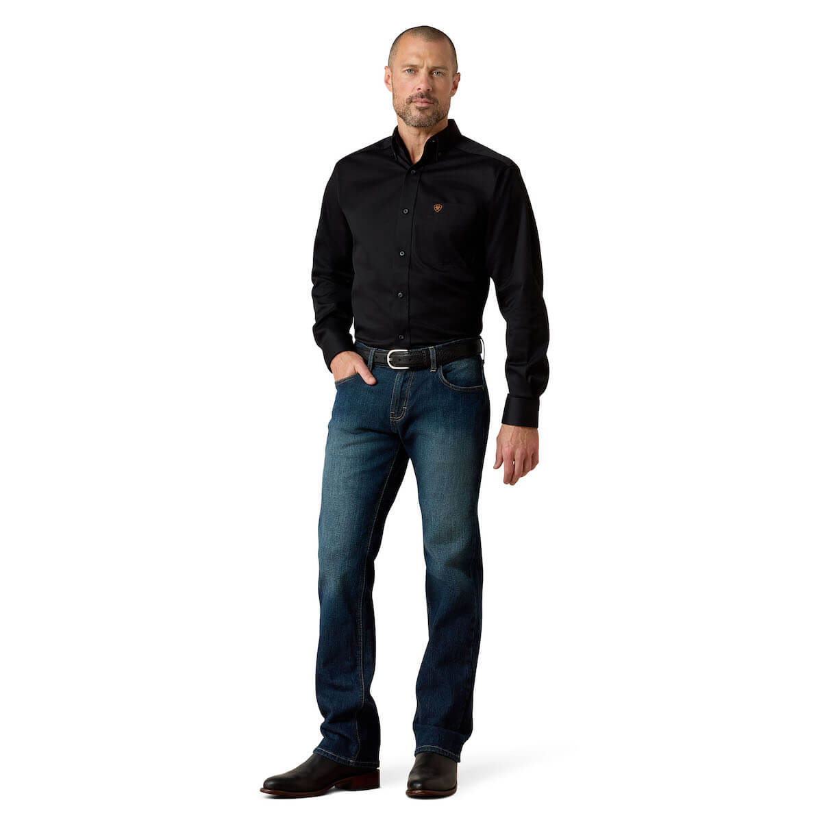 Man wearing a black shirt and blue jeans on a white background