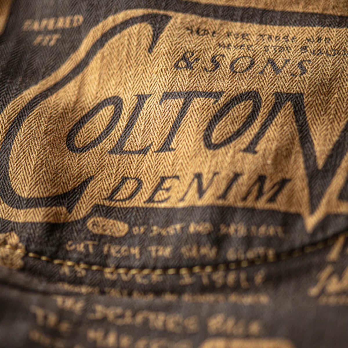 Close-up of Colton Denim label on denim fabric