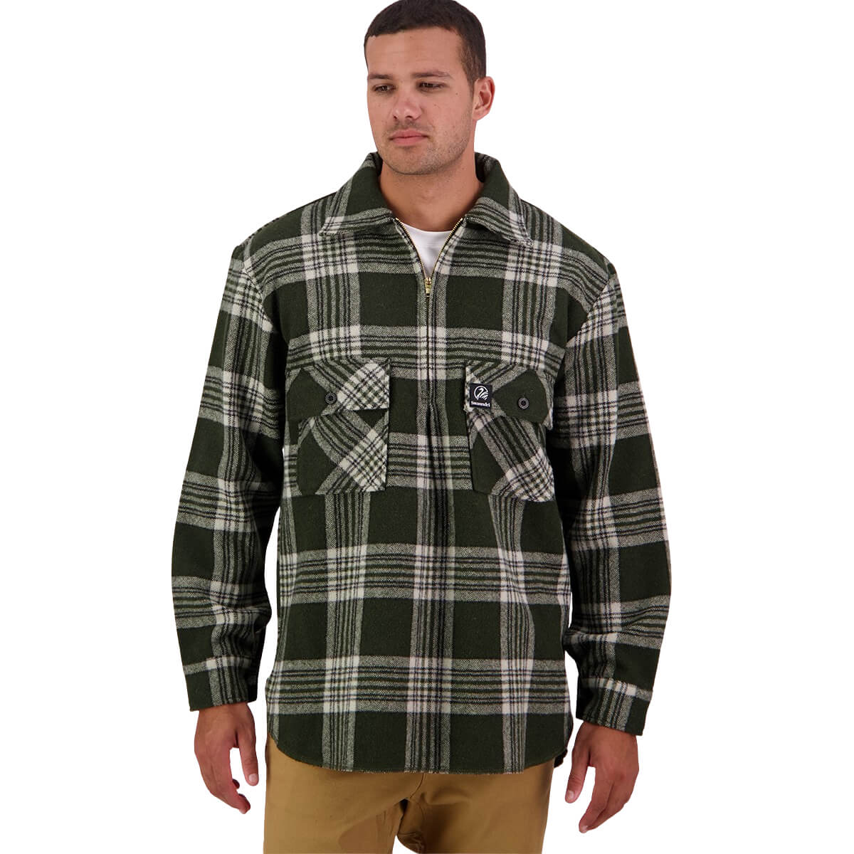 Man wearing a green plaid shirt on a white background