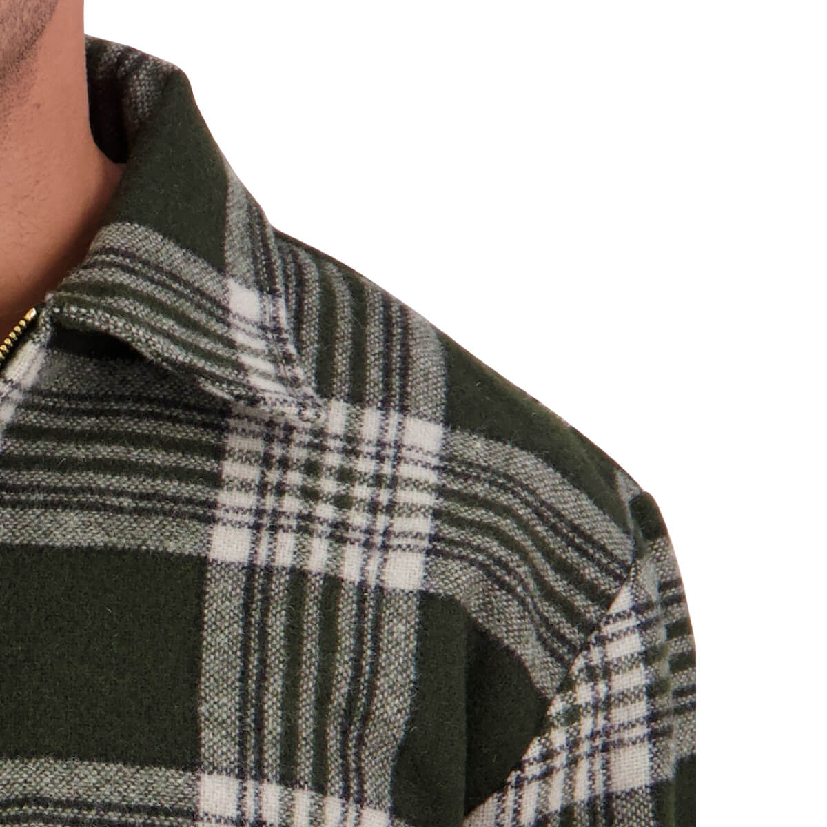 Close-up of a plaid shirt with green, gray, and white pattern on a white background