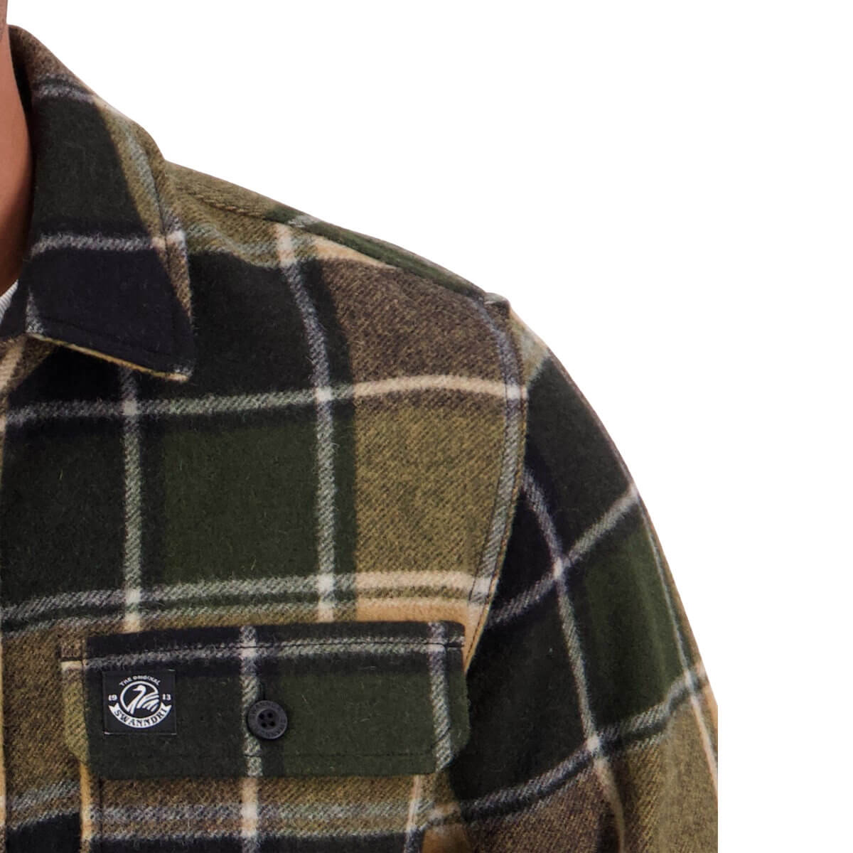 Plaid shirt with a button and brand logo on a white background