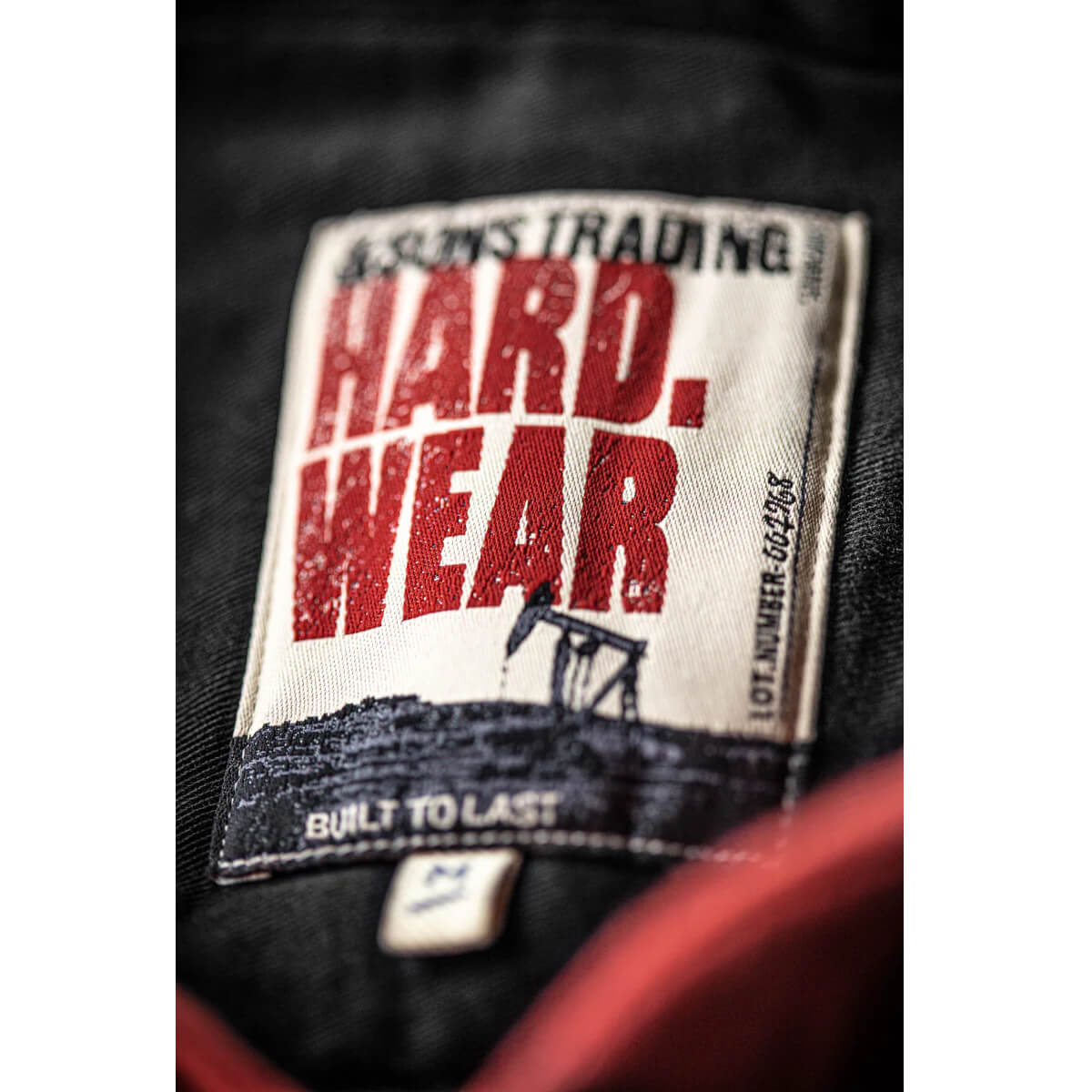 Close-up of a label with 'Hard Wear' text on a product.