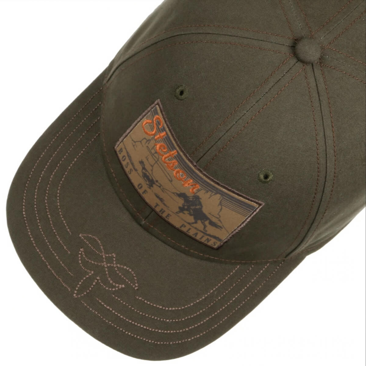Green cap with a leather patch on a white background