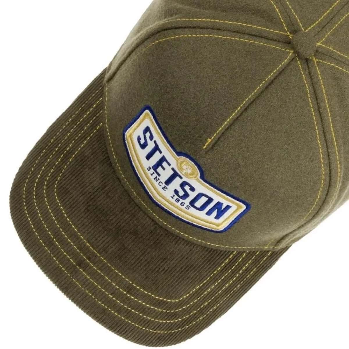 Stetson baseball cap with yellow contrast stitching and a prominent Stetson logo patch on the front, shown against a plain white background.