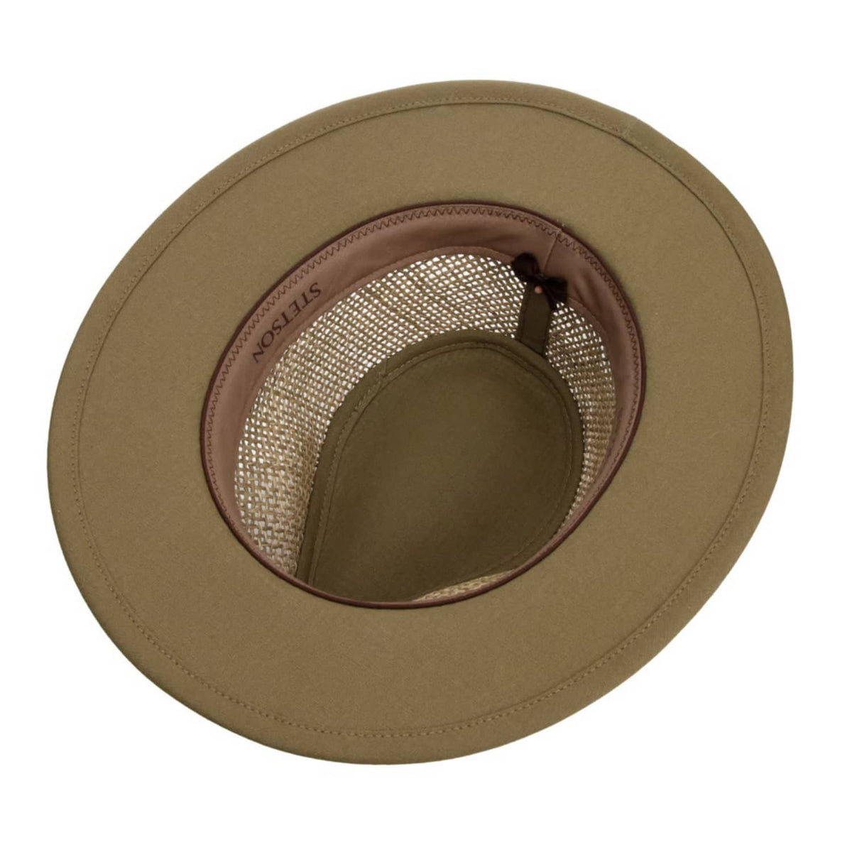 A top-down view of a khaki-colored wide-brimmed Stetson Travekker hat, showing the inner crown, mesh lining, and a brown inner band with 'SETSON' printed on it.