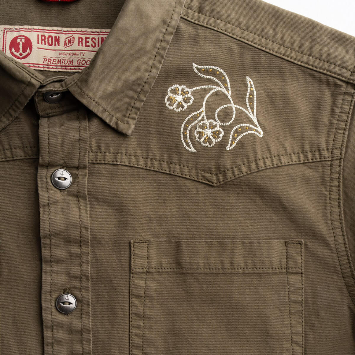 Brown shirt with floral embroidery and Iron Resin label
