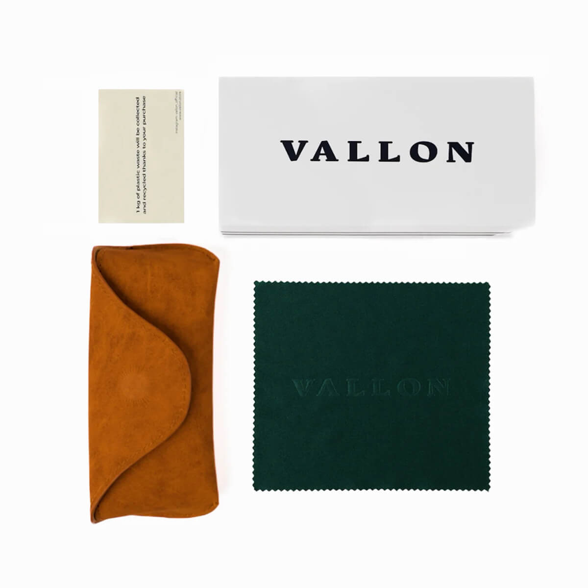 Vallon cleaning kit with cloth, lens cloth, and card on a white background