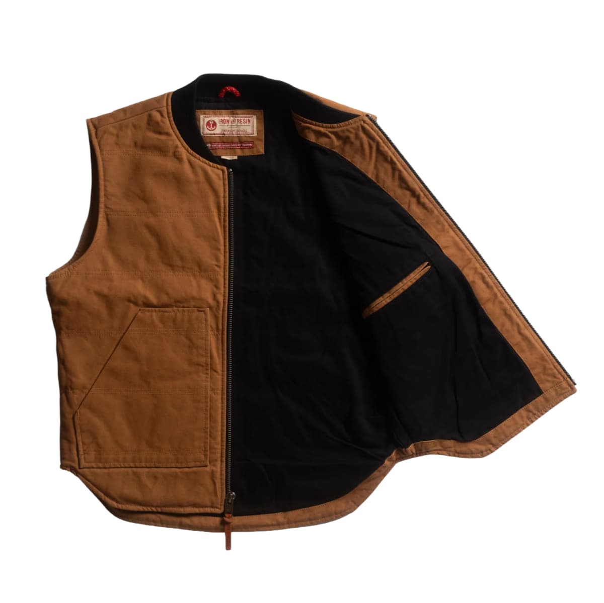 A brown canvas motorcycle vest with a black interior lining, shown open against a plain white background.
