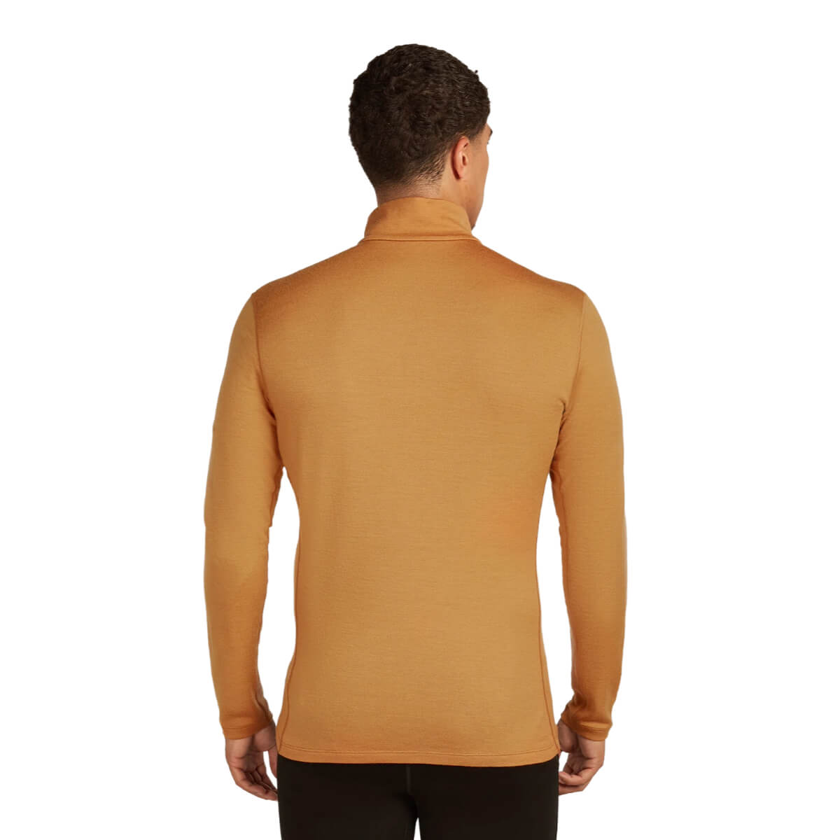 Man wearing a mustard yellow long-sleeve shirt on a white background