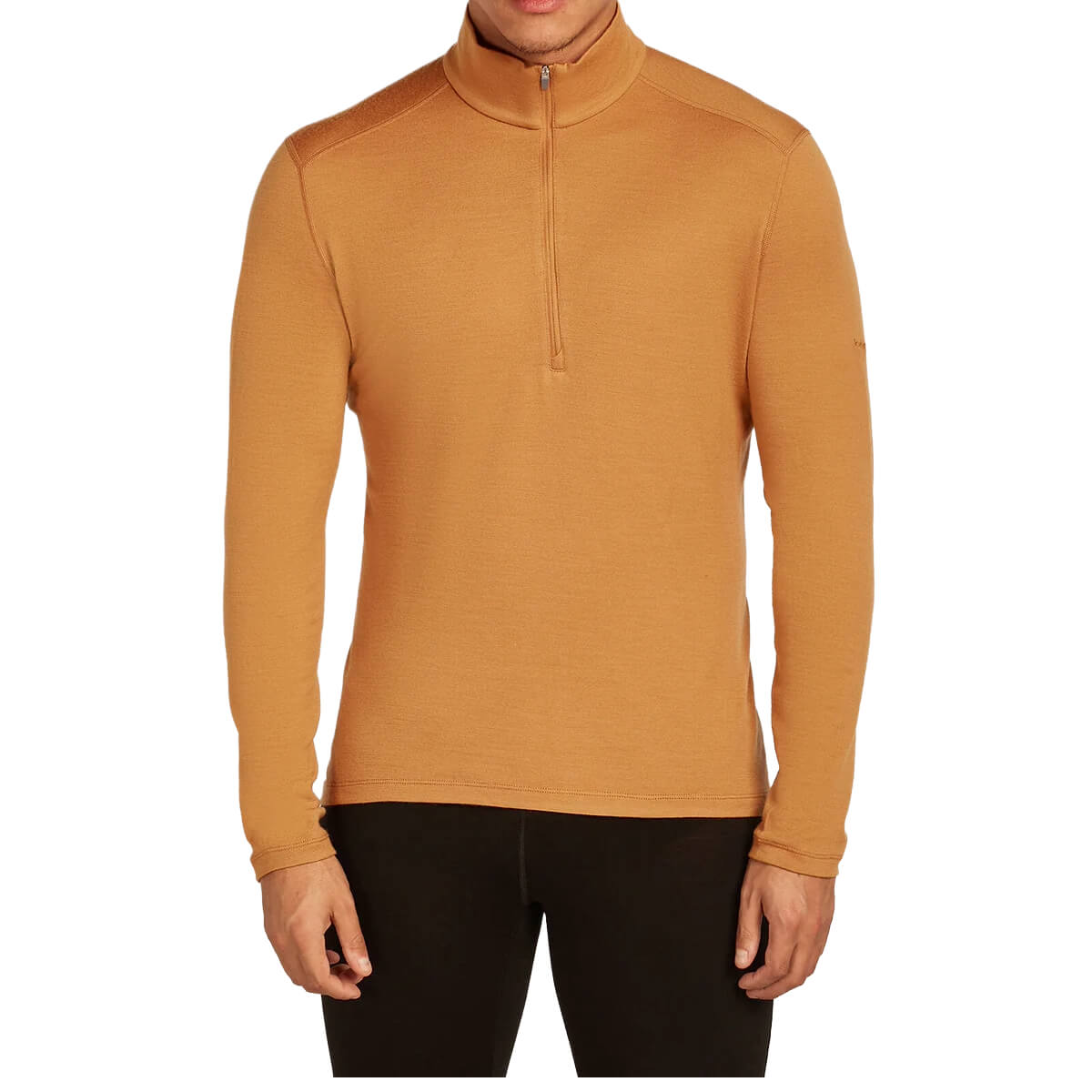 Man wearing a mustard yellow long-sleeve shirt with a quarter zip on a white background